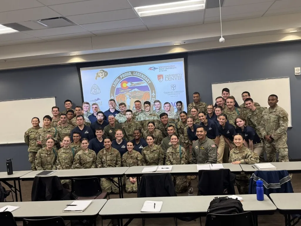 AFROTC cadets posing for a group photo in a classroom